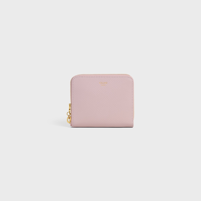 Small Zipped Wallet TRIOMPHE CHARMS IN GRAINED CALFSKIN - BLEACHED PINK - WALLETS - 1 | CELINE