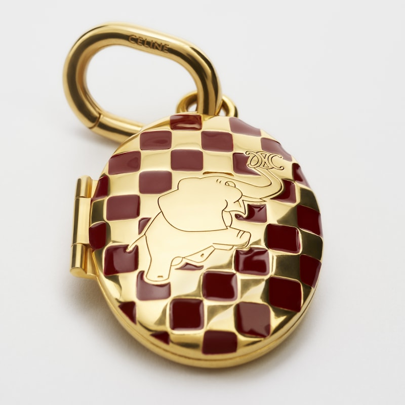 CHARMS ELEPHANT LOCKET IN BRASS WITH GOLD FINISH, ENAMEL AND STEEL - GOLD / BURGUNDY / SILVER - CELINE CHARMS - 1 | CELINE