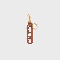 PERFORATED KEYRING CHARM CELINE IN SMOOTH CALFSKIN - TAN - BAG CHARMS - 1 | CELINE