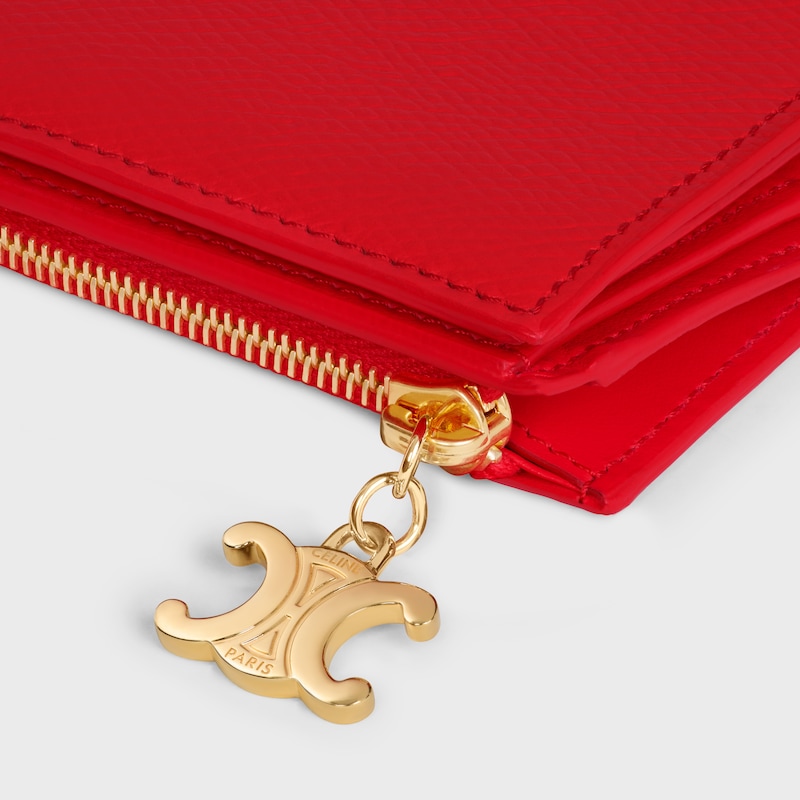 PORTEFEUILLE COMPACT TRIOMPHE CHARMS VEAU GRAIN&eacute; - ULTRA ROUGE - PORTEFEUILLES - 1 | CELINE