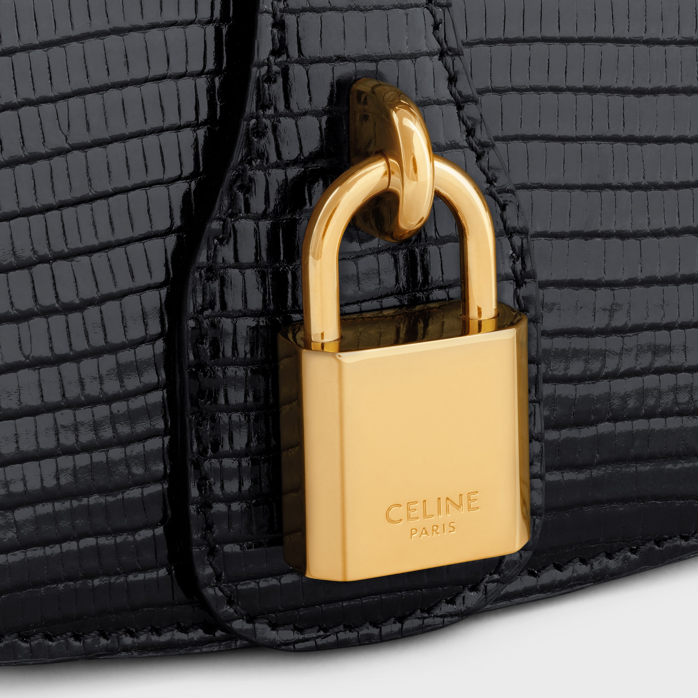 CLUTCH ON STRAP TABOU in lizard - BLACK | CELINE