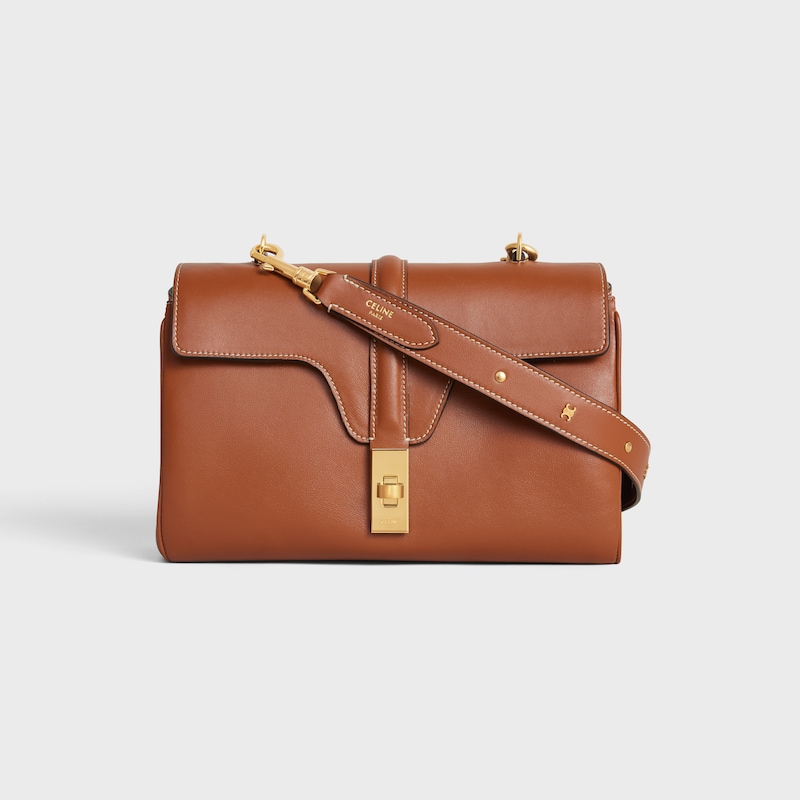 TRIOMPHE飾釘光滑牛皮革長肩帶 - 棕黃色 - 手袋吊饰 - 1 | CELINE