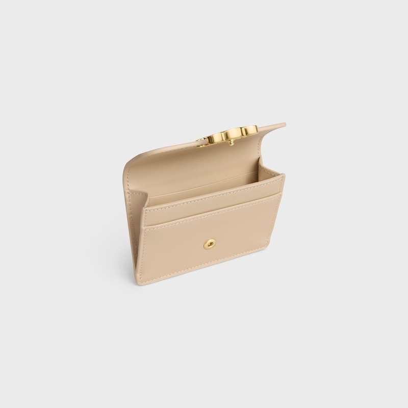 CARD HOLDER WITH FLAP TRIOMPHE IN Shiny calfskin - DEEP IVORY - NEW - 1 | CELINE