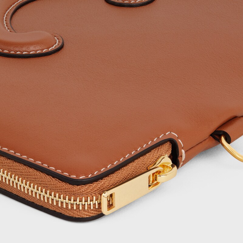 POCHETTE PEQUE&Ntilde;O CON CORREA DE PIEL TRIOMPHE DE PIEL DE BECERRO LISA - TOSTADO - POCHETTES Y ACCESORIOS PARA TECNOLOG&Iacute;A - 1 | CELINE