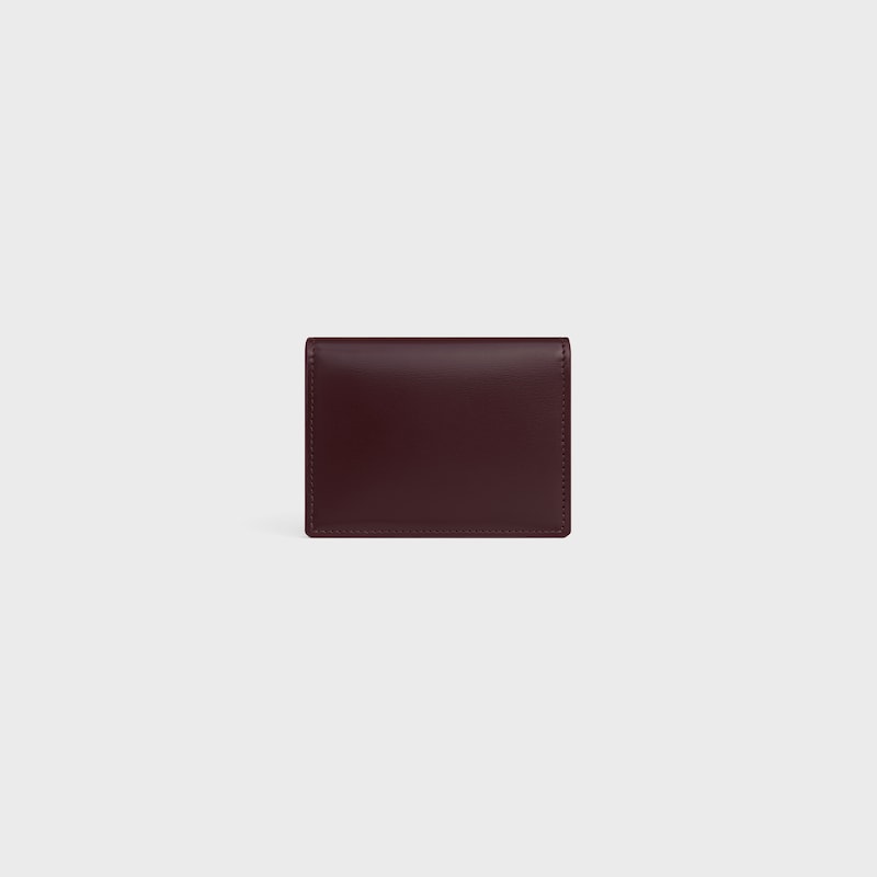 BI-FOLD CARD HOLDER TRIOMPHE IN Shiny calfskin - DEEP BURGUNDY - COIN AND CARD HOLDERS - 1 | CELINE