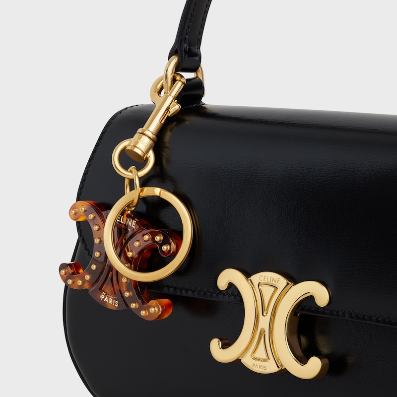 TRIOMPHE KEYRING CHARM in PLEXIGLASS with GOLD FINISHING - TORTOISESHELL - BAG CHARMS - 1 | CELINE
