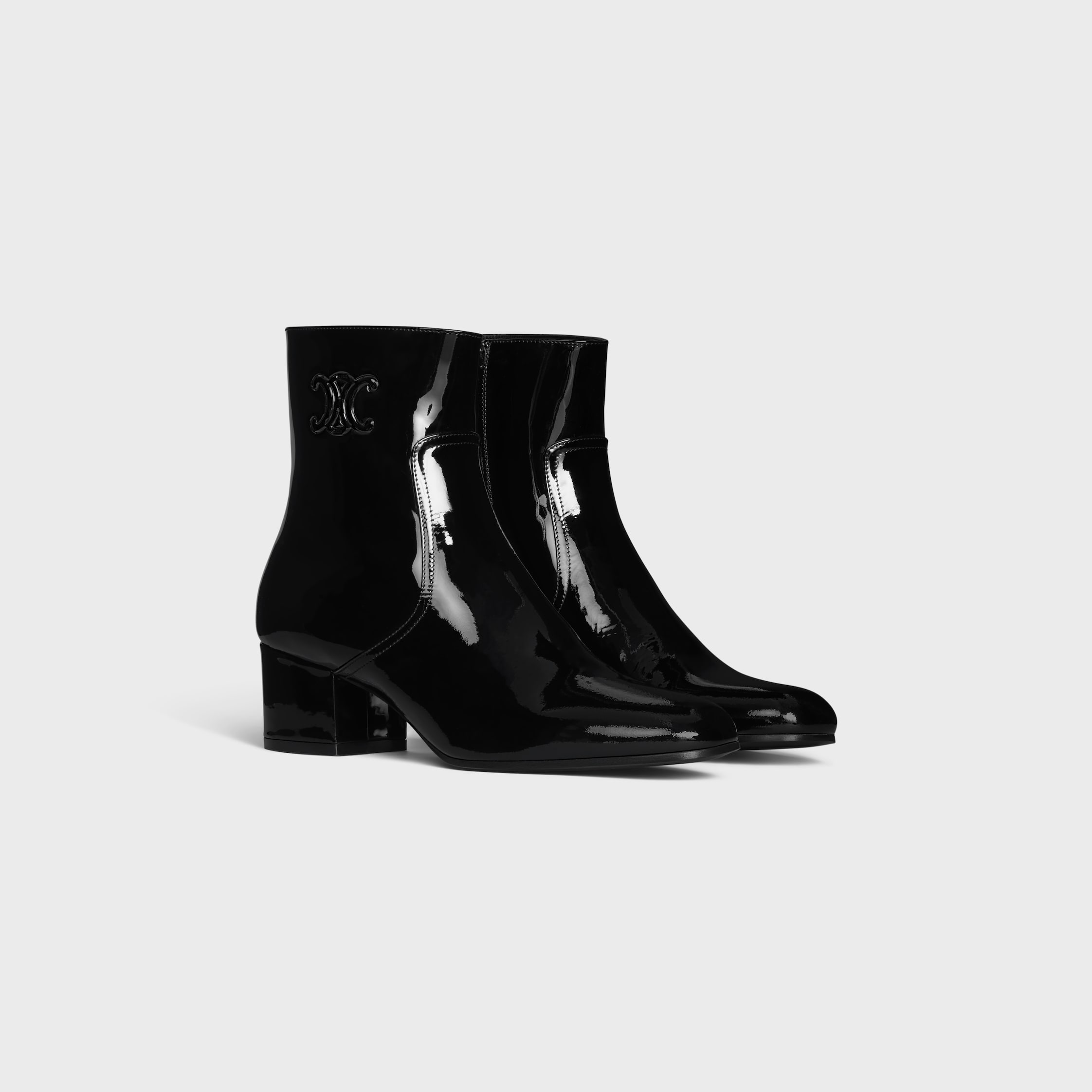 LES BOTTES CELINE TRIOMPHE ZIPPED BOOT IN PATENT CALFSKIN