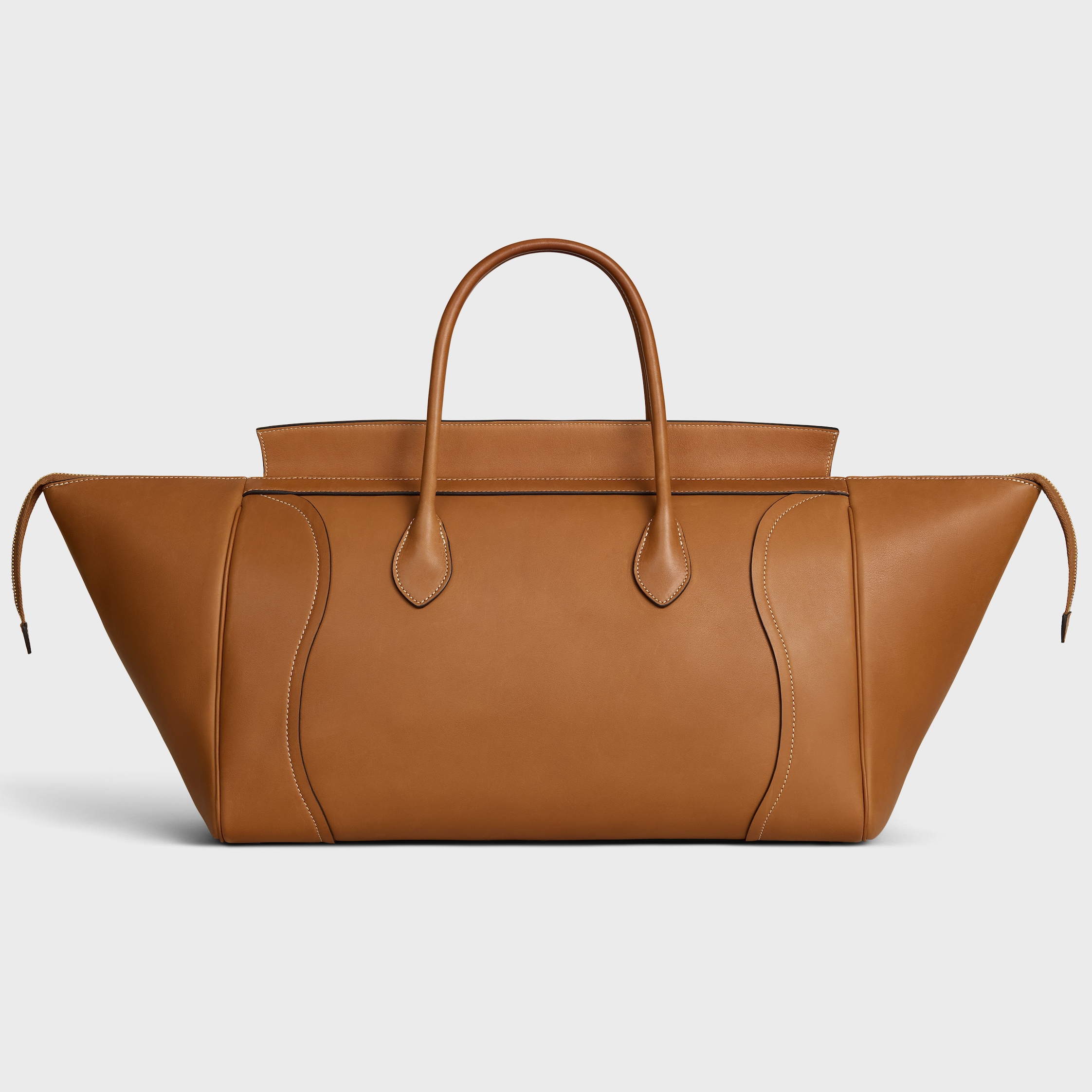 BIG SMILE LUGGAGE IN NATURAL SUPPLE CALFSKIN - GOLDEN TAN | CELINE