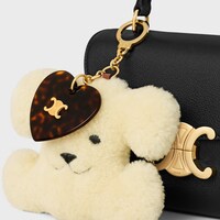 TRIOMPHE pom-pom keyring  with heart in SHEARLING AND ACETATE with GOLD FINISHING - NATURAL / TAN - CHARMS AND ACCESSORIES - 1 | CELINE