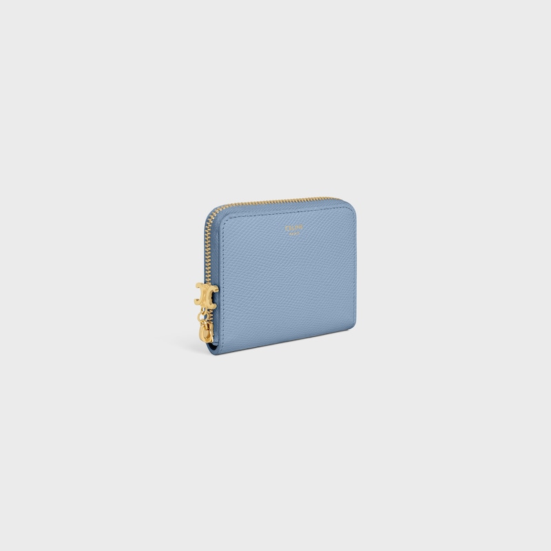 Small Zipped Wallet TRIOMPHE CHARMS IN GRAINED CALFSKIN - LIGHT DENIM - WALLETS - 1 | CELINE
