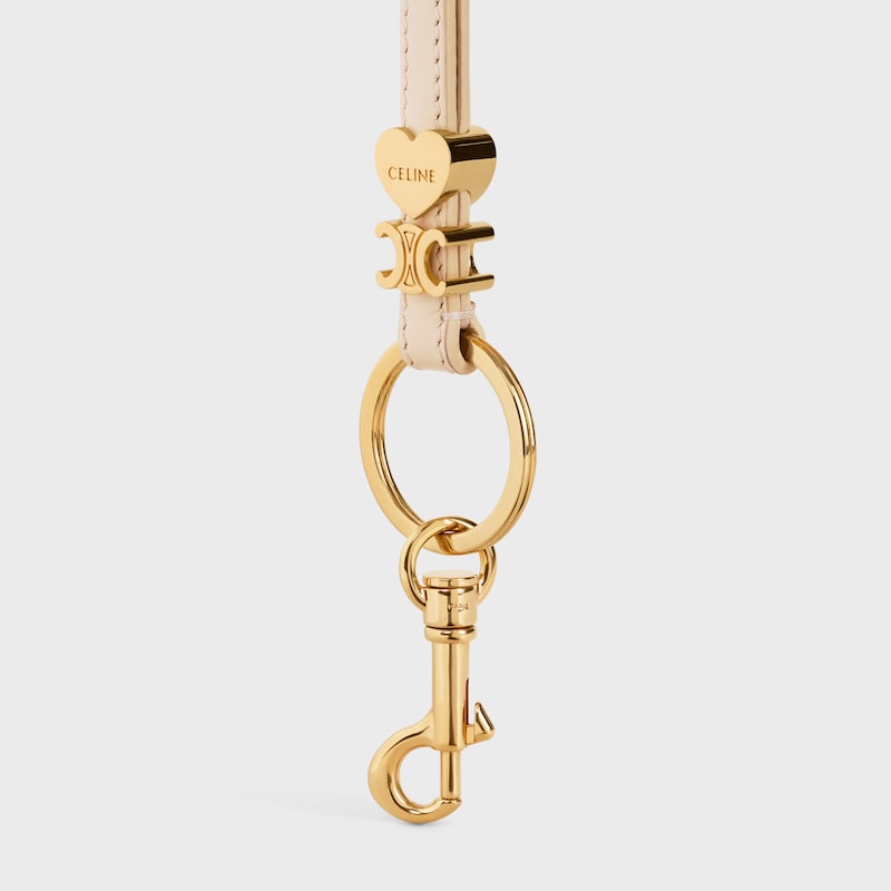 TRIOMPHE CHARM IN SMOOTH CALFSKIN - CREAM - CHARMS AND ACCESSORIES - 1 | CELINE