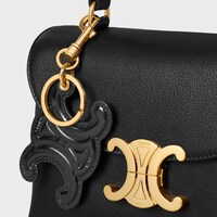 KEYRING TRIOMPHE CHARM in PATENT CALFSKIN with GOLD FINISHING - BLACK - CHARMS AND ACCESSORIES - 1 | CELINE