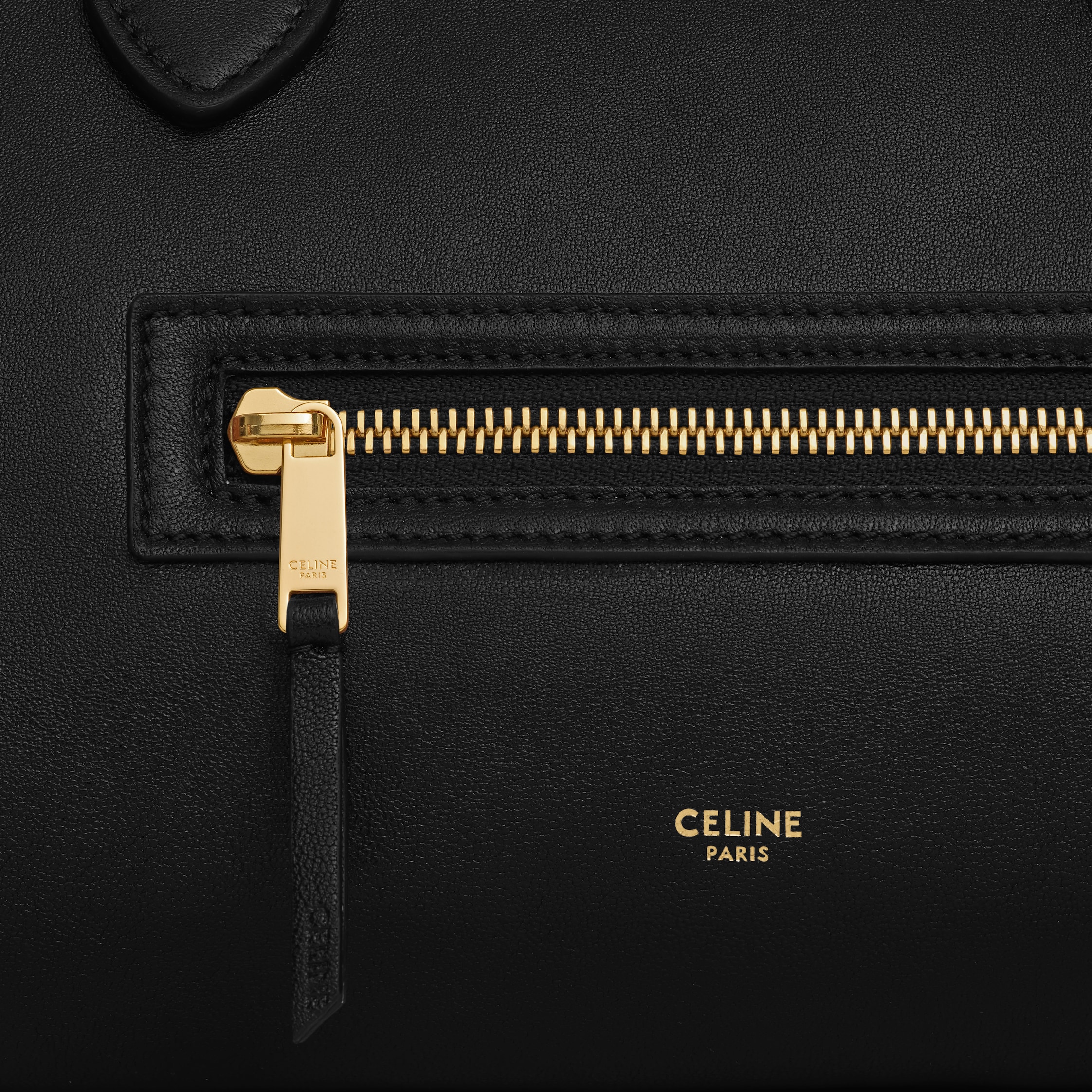 MEDIUM NEW LUGGAGE IN SUPPLE SHINY LAMBSKIN - BLACK | CELINE