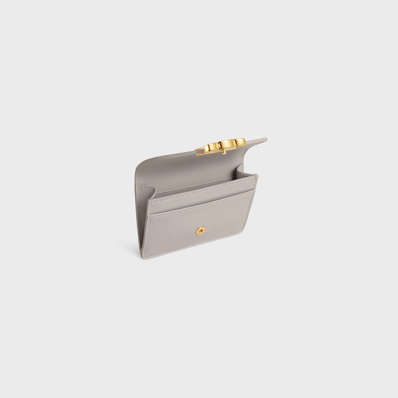CARD HOLDER WITH FLAP TRIOMPHE IN Shiny calfskin - SOFT GREY - COIN AND CARD HOLDERS - 1 | CELINE