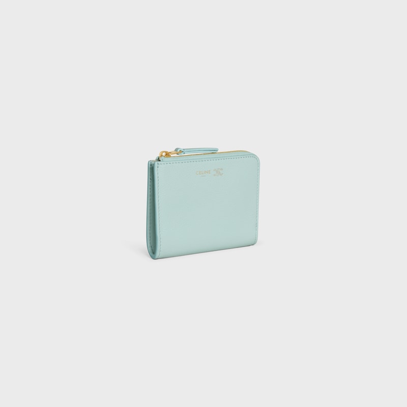 FLAT ZIPPED WALLET TRIOMPHE STAMP IN GRAINED SUPPLE CALFSKIN - POWDER BLUE / DEEP IVORY - NEW - 1 | CELINE