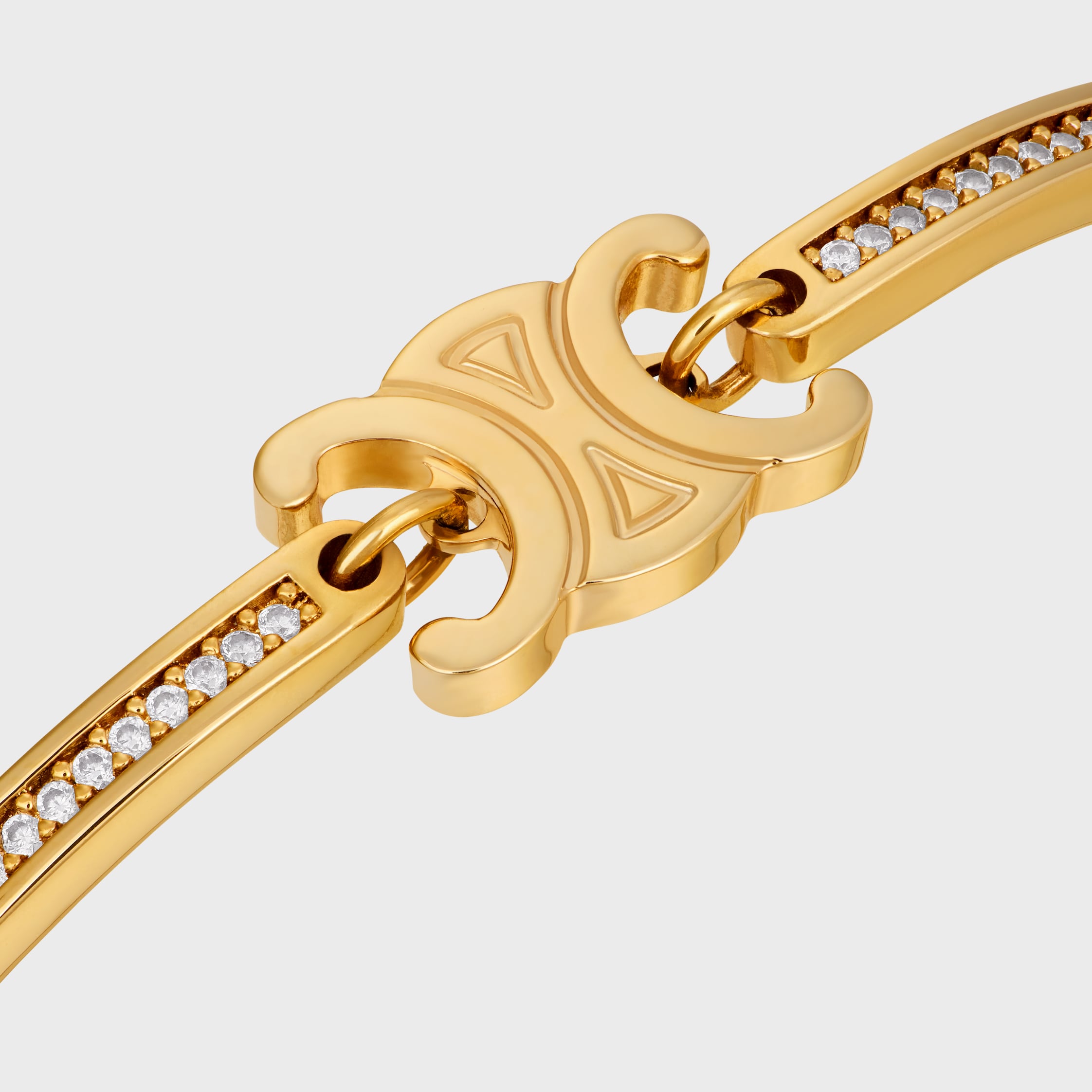 TRIOMPHE ARTICULATED SPARKLE BRACELET IN STRASS AND BRASS
