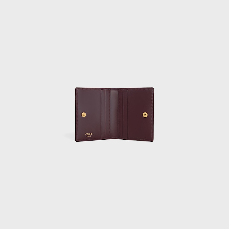 BI-FOLD CARD HOLDER TRIOMPHE IN Shiny calfskin - DEEP BURGUNDY - COIN AND CARD HOLDERS - 1 | CELINE