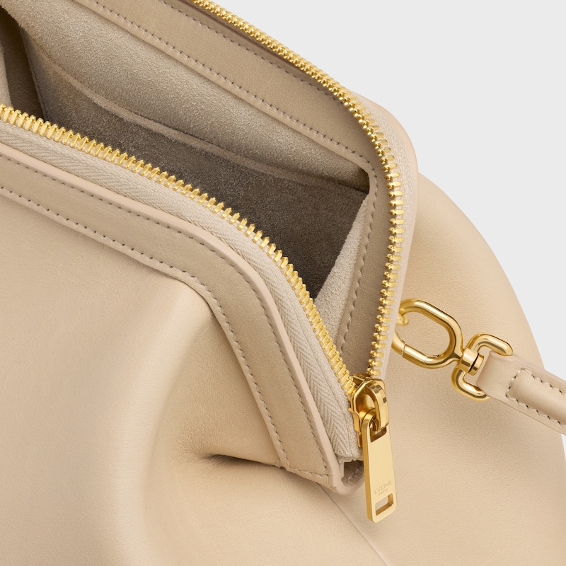 SMALL DOCTOR POUCH IN SUPPLE NATURAL CALFSKIN - DEEP IVORY - SHOULDER BAGS - 1 | CELINE