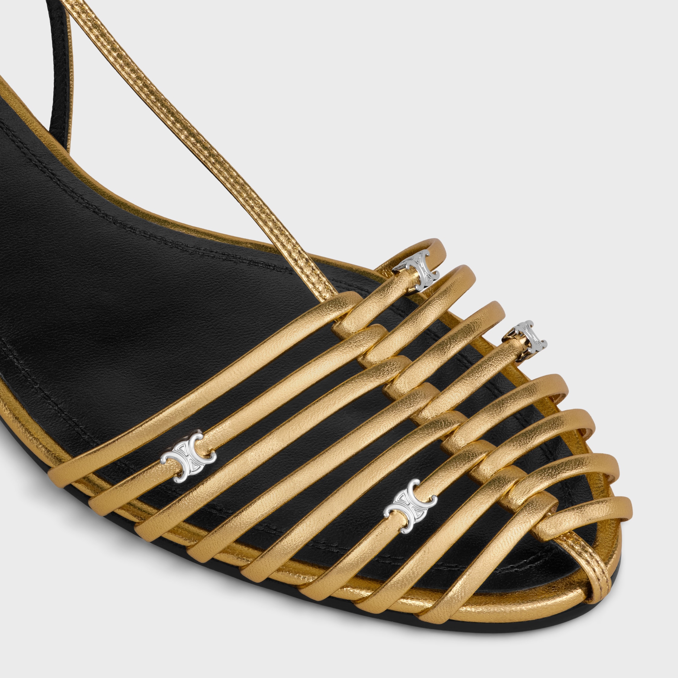 CAGE FLAT SANDAL IN LAMINATED LAMBSKIN - GOLD | CELINE