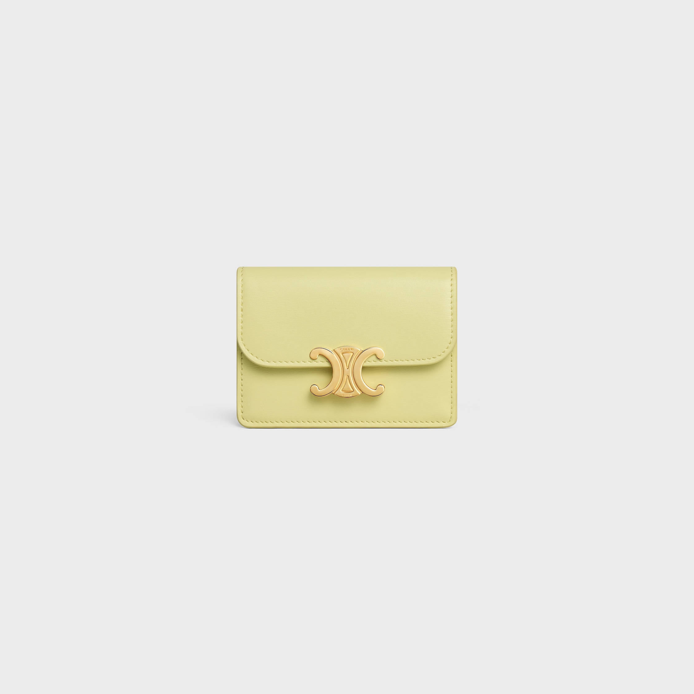 CARD HOLDER WITH FLAP TRIOMPHE IN SHINY CALFSKIN - CITRUS | CELINE