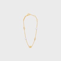 Les Perles Celine Bracelet in Resin Pearls, Strass and Brass with Gold Finish - GOLD / IVORY -  - 1 | CELINE