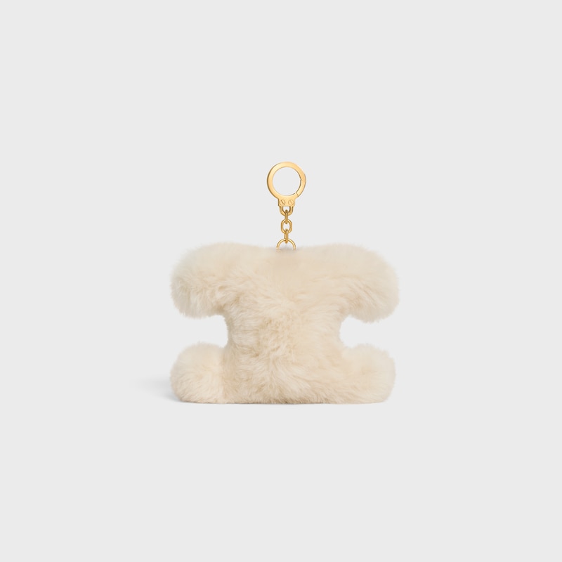 TRIOMPHE POM POM CHARM WITH PLUM FLOWER IN SHEARLING AND CALFSKIN - RICE - BAG CHARMS - 1 | CELINE