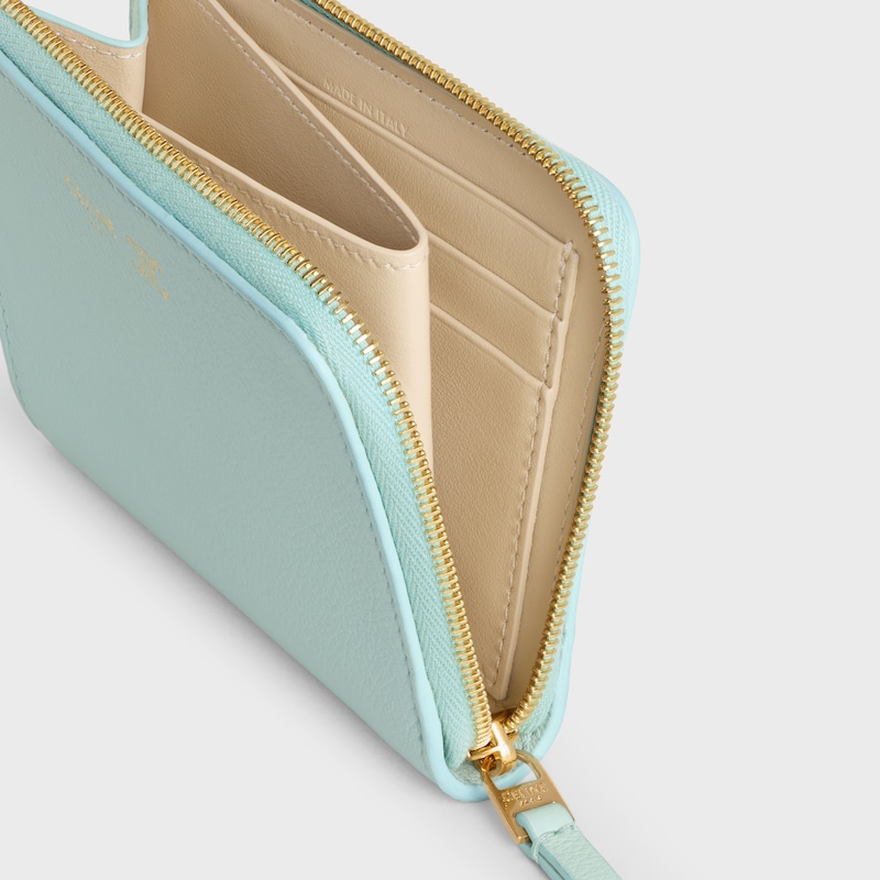 FLAT ZIPPED WALLET TRIOMPHE STAMP IN GRAINED SUPPLE CALFSKIN - POWDER BLUE / DEEP IVORY - NEW - 1 | CELINE