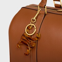 LARGE TRIOMPHE KEYRING CHARM IN ACETATE - TORTOISESHELL - CHARMS AND ACCESSORIES - 1 | CELINE