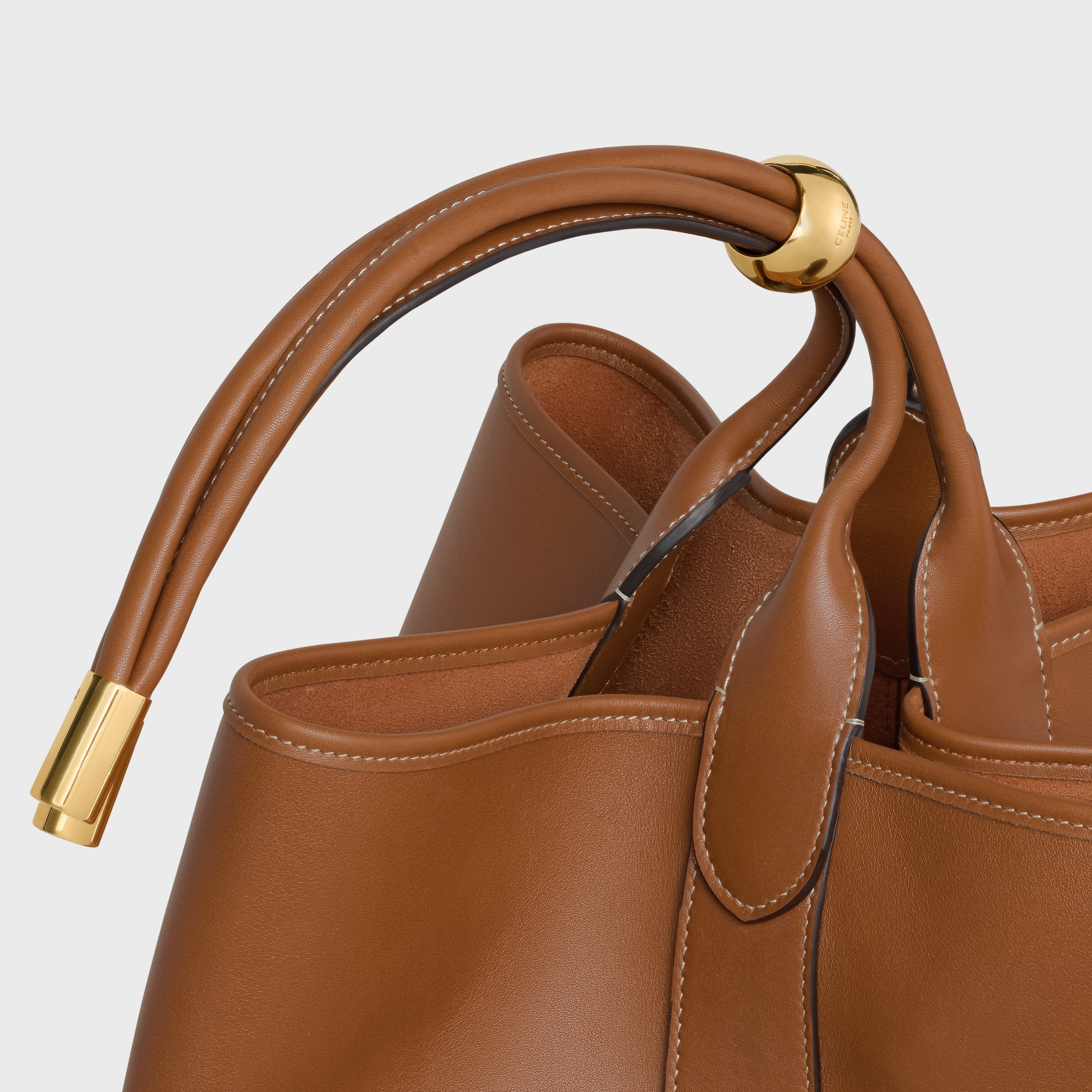LARGE DROP BUCKET BAG IN SUPPLE SMOOTH CALFSKIN - GOLDEN TAN | CELINE