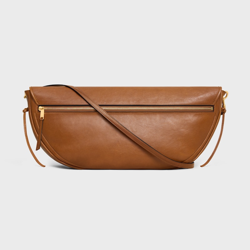 BOLSO HALFMOON SOFT TRIOMPHE DE PIEL DE CORDERO BRILLANTE Y FLEXIBLE - TOSTADO SUAVE - BOLSOS EN BANDOLERA - 1 | CELINE