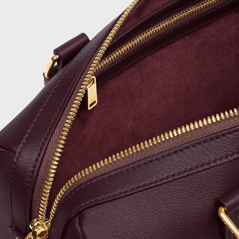 MEDIUM BOSTON IN SUPPLE GRAINED CALFSKIN - DEEP BURGUNDY - MORE LINES - 1 | CELINE