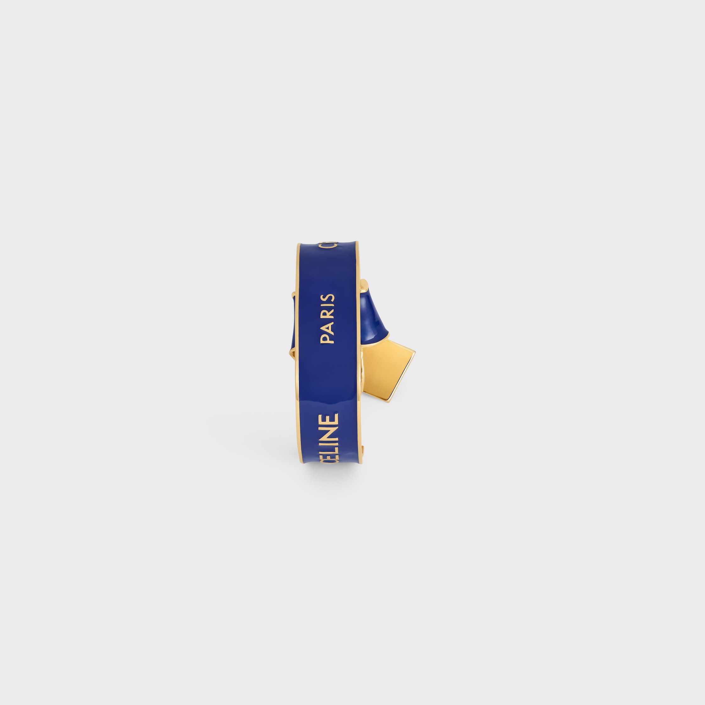 Celine Ribbon Knotted Cuff in Enamel and Brass with gold finish