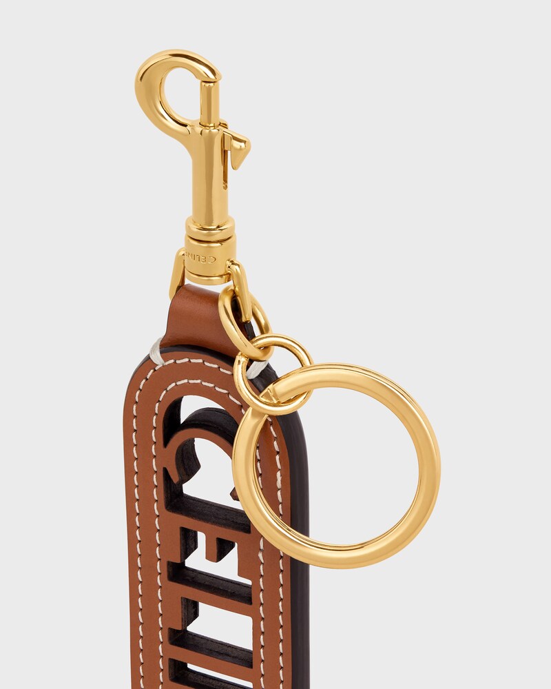 PERFORATED KEYRING CHARM CELINE IN SMOOTH CALFSKIN - TAN - CHARMS AND ACCESSORIES - 1 | CELINE