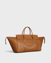 BIG SMILE LUGGAGE IN Natural Supple Calfskin - GOLDEN TAN - LUGGAGE - 2 | CELINE