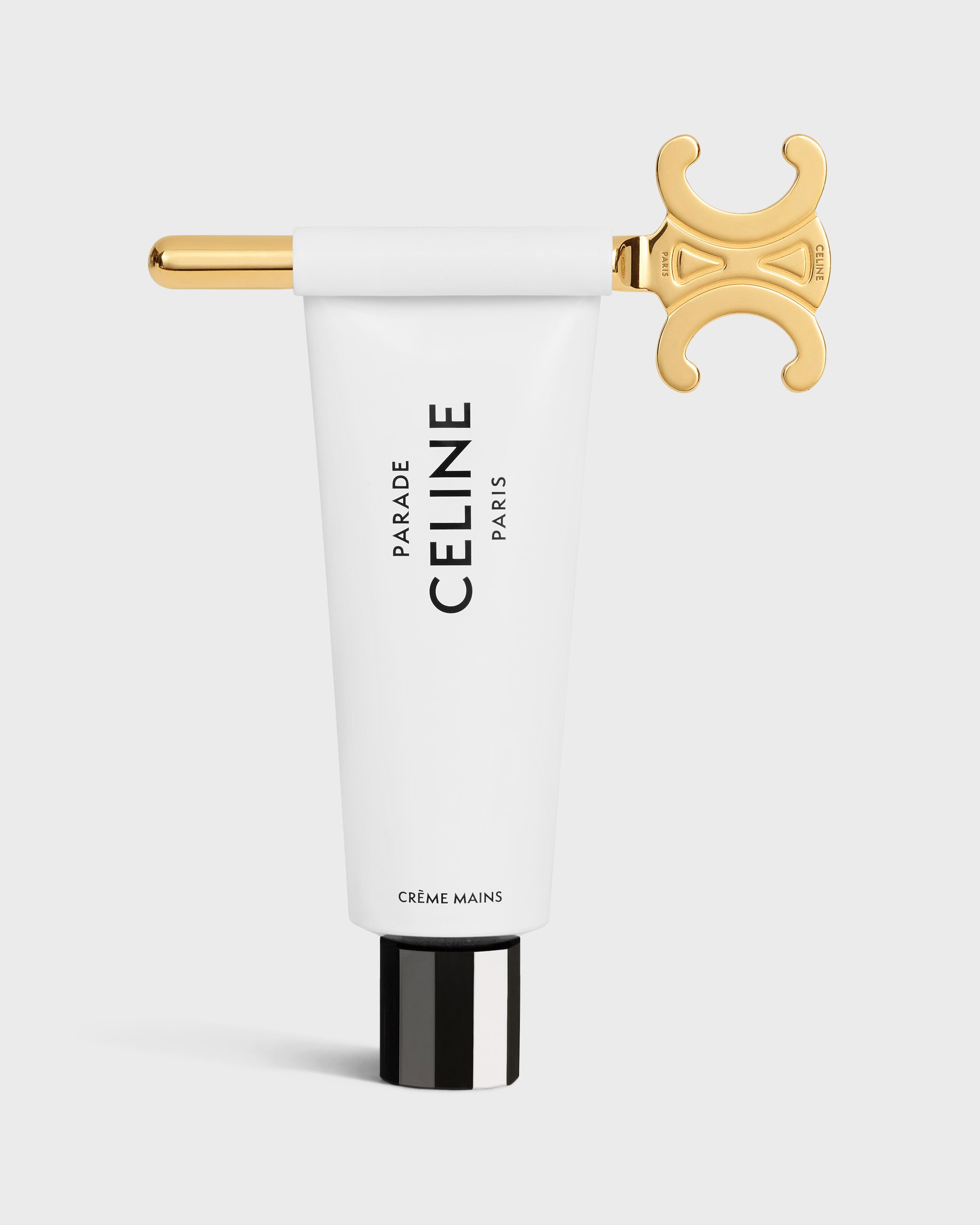 TRIOMPHE TUBE SQUEEZER IN BRASS - GOLD | CELINE