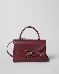 TEEN NINO BAG IN SMOOTH SATINATED CALFSKIN WITH ENAMEL CLOSURE - SYRAH - NINO - 1 | CELINE