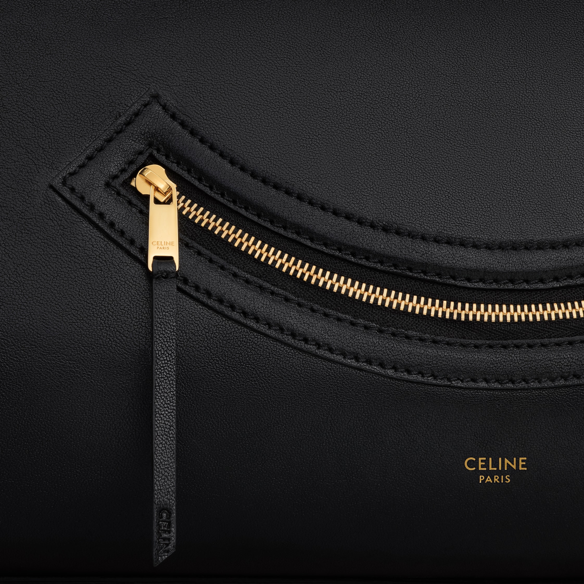 BIG SMILE LUGGAGE IN SUPPLE SHINY LAMBSKIN - BLACK | CELINE