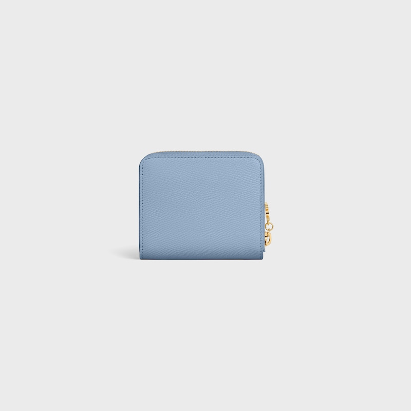 Small Zipped Wallet TRIOMPHE CHARMS IN GRAINED CALFSKIN - LIGHT DENIM - WALLETS - 1 | CELINE