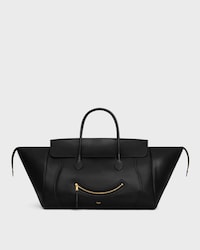 BIG SMILE LUGGAGE IN SUPPLE SHINY LAMBSKIN - BLACK - LUGGAGE - 1 | CELINE