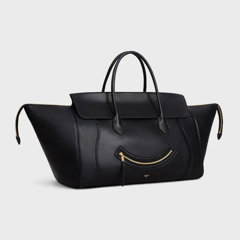 BIG SMILE LUGGAGE IN SUPPLE SHINY LAMBSKIN - BLACK - LUGGAGE - 1 | CELINE