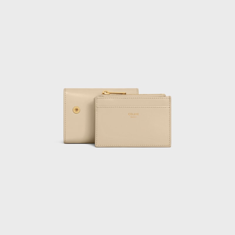 COMPACT WALLET WITH COIN TRIOMPHE IN Shiny calfskin - DEEP IVORY - WALLETS - 1 | CELINE