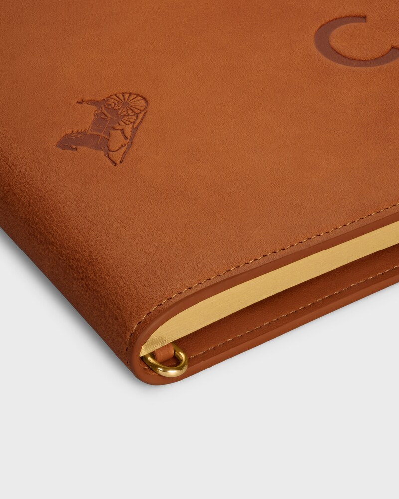LARGE NOTEBOOK COVER WITH POUCH IN STAMPED NATURAL CALFSKIN - TAN - MEN - 1 | CELINE