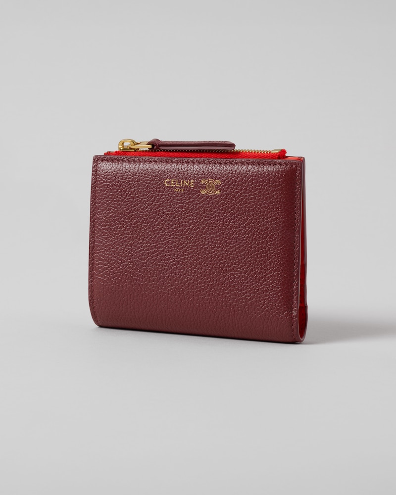 COMPACT WALLET TRIOMPHE STAMP IN GRAINED SUPPLE CALFSKIN - SYRAH / ULTRA RED - WALLETS - 1 | CELINE