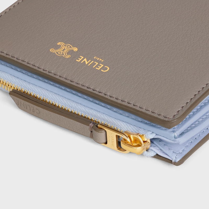 COMPACT WALLET TRIOMPHE STAMP IN SUPPLE GRAINED CALFSKIN - PEBBLE / LIGHT BLUE - WALLETS - 1 | CELINE