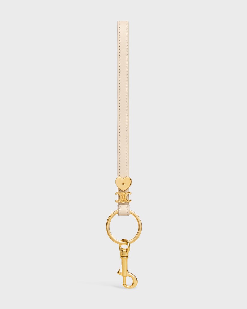 TRIOMPHE CHARM IN SMOOTH CALFSKIN - CREAM - CHARMS AND ACCESSORIES - 1 | CELINE