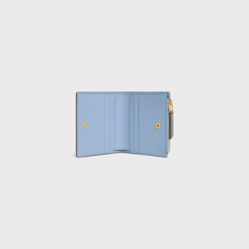 COMPACT WALLET TRIOMPHE STAMP IN SUPPLE GRAINED CALFSKIN - PEBBLE / LIGHT BLUE - WALLETS - 1 | CELINE