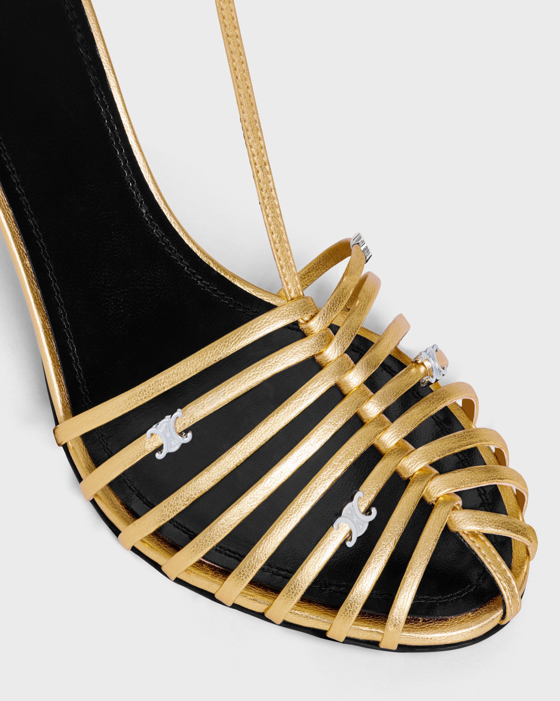 CAGE HEELED SANDAL IN LAMINATED LAMBSKIN - GOLD | CELINE