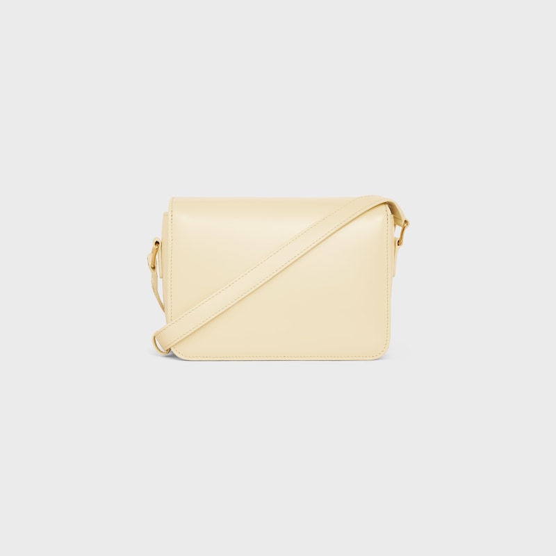 Bolso Teen Triomphe de piel de becerro brillante - SOFT YELLOW - TRIOMPHE - 1 | CELINE