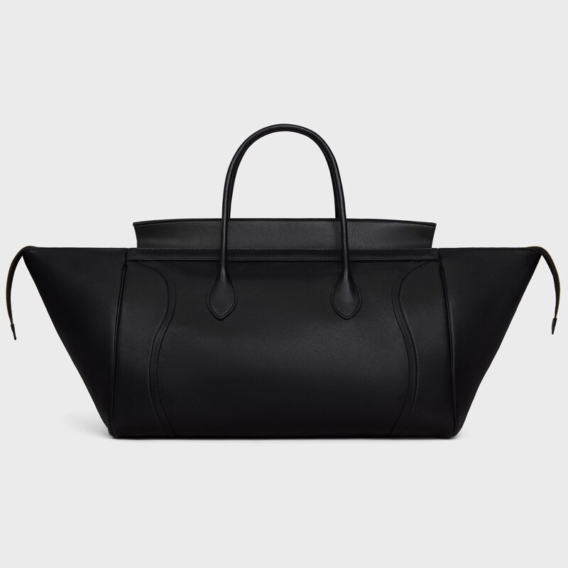 BIG SMILE LUGGAGE IN SUPPLE SHINY LAMBSKIN - BLACK - LUGGAGE - 1 | CELINE