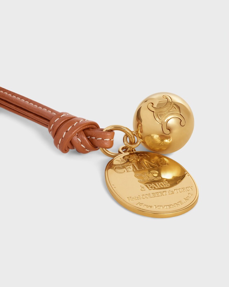 MAISON CELINE MEDALLION CHARM IN SMOOTH LAMBSKIN AND METAL - TAN - BAG CHARMS - 1 | CELINE